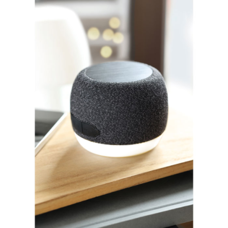 Enceinte publicitaire en ABS et tissu RPET avec base lumière d'ambiance chargeur sans fil et batterie rechargeable Li-ION 1200 m